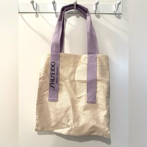 Shiseido Beige Tote with Lavender Straps